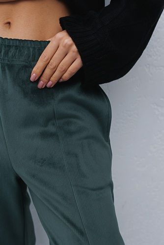 Теплі штани з велюру із вертикальними швами та розрізами, Смарагдовий, S-M