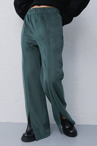 Теплі штани з велюру із вертикальними швами та розрізами, Смарагдовий, S-M